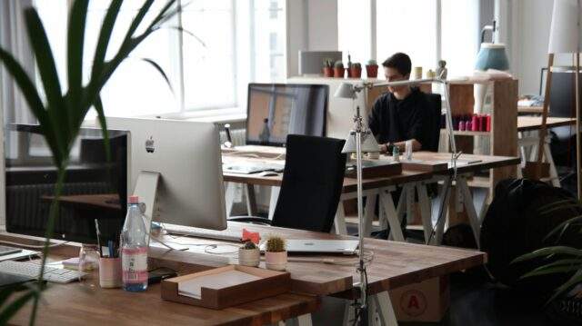 An office in London, with some empty desks.